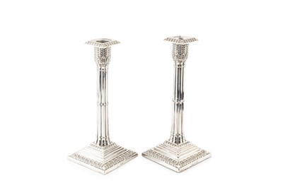 Lot 651 - A pair of late Victorian silver candlesticks,...