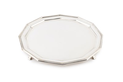 Lot 658 - A George V silver salver, with faceted border,...