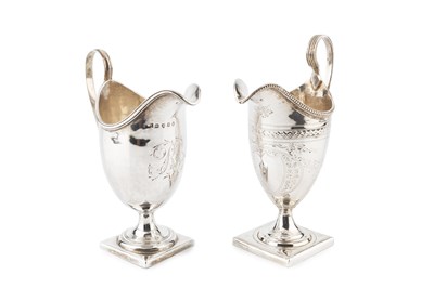 Lot 661 - A George III silver pedestal cream jug, with...