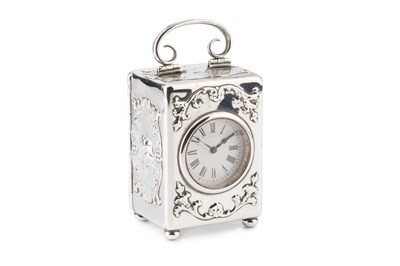 Lot 551 - An Edwardian silver carriage timepiece, having...