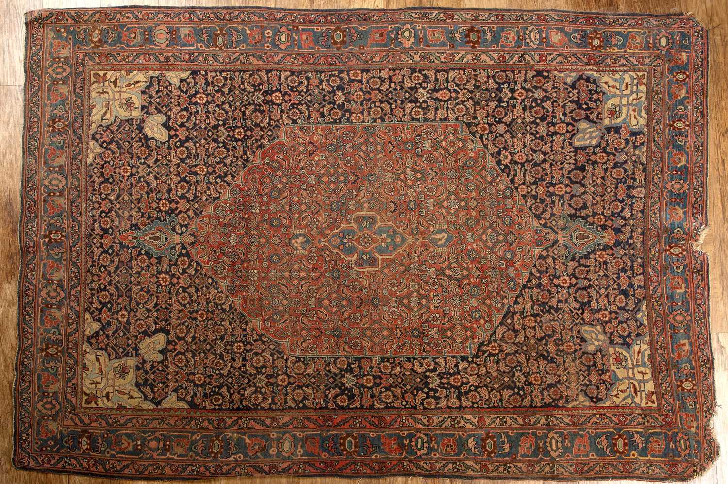 Lot 45 - Blue ground rug Persian, with a red ground...