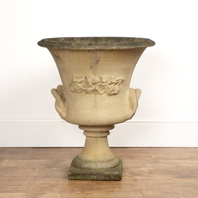 Lot 19 - Campana shaped reconstituted stone urn with a...