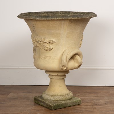 Lot 19 - Campana shaped reconstituted stone urn with a...