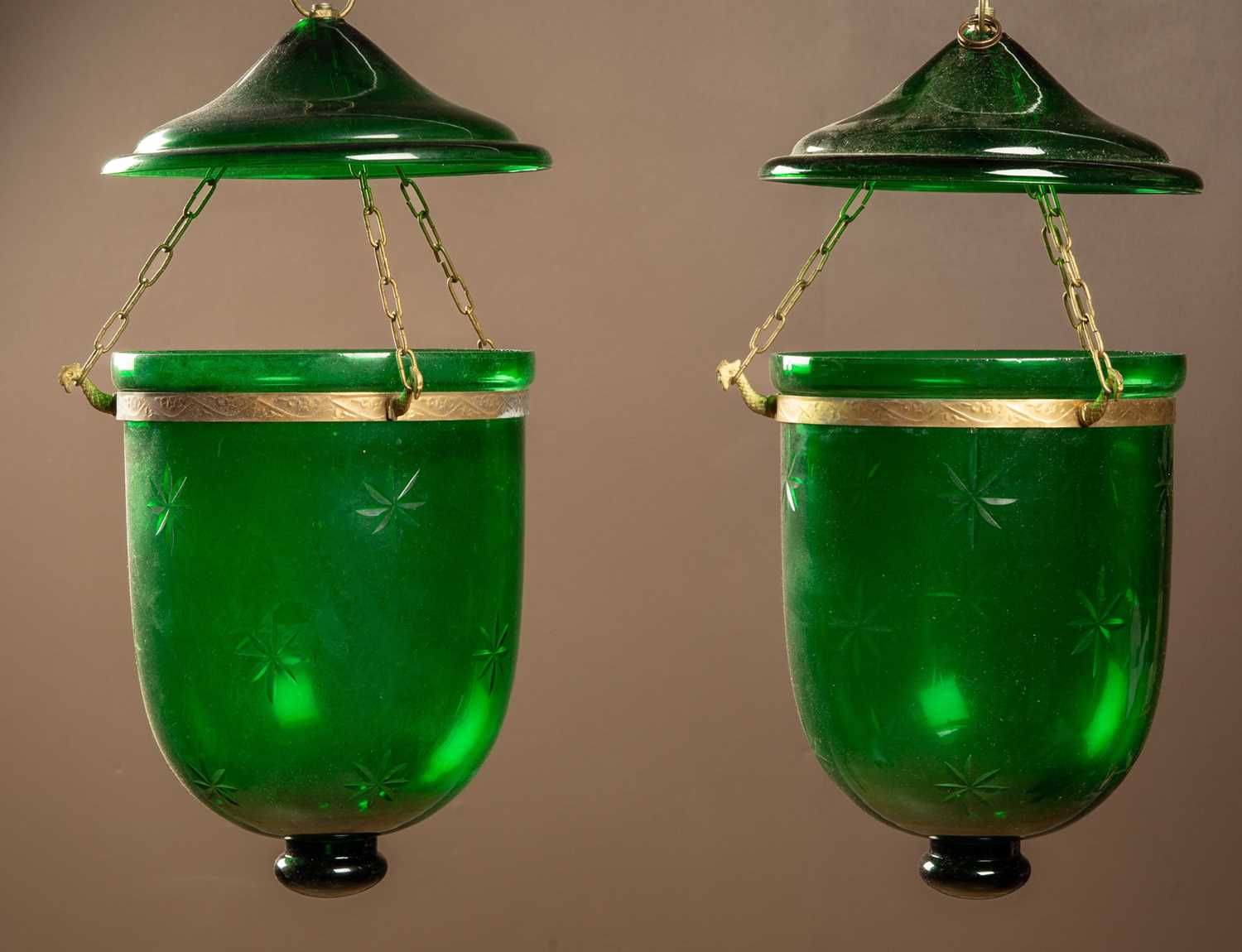 Lot 531 - A pair of green cut glass hanging lanterns
