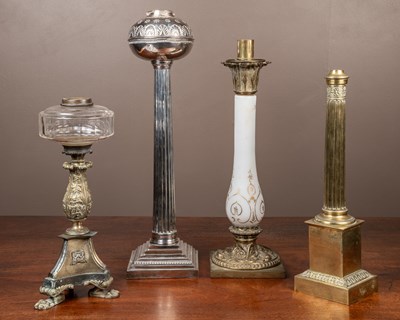 Lot 102 - A collection of four lamps