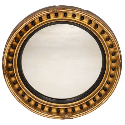 Lot 1005 - A convex wall mirror