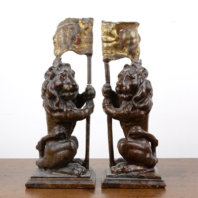 Lot 300 - Pair of armorial newel posts or finials in the...