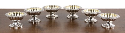 Lot 319 - Matched set of six Georgian silver salts of...