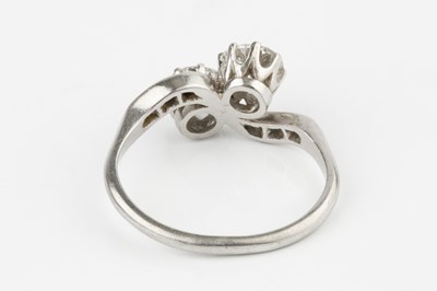 Lot 36 - A diamond two stone ring, the brilliant-cut...