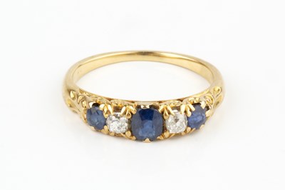 Lot 37 - A sapphire and diamond five stone ring, the...