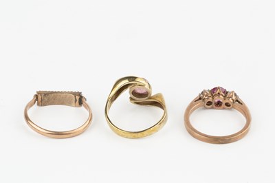 Lot 39 - A 9ct gold dress ring, set with a single pink...