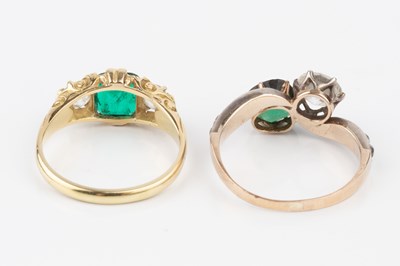 Lot 13 - An emerald and diamond three stone ring, the...