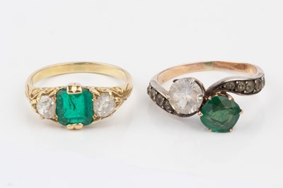 Lot 13 - An emerald and diamond three stone ring, the...