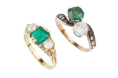 Lot 13 - An emerald and diamond three stone ring, the...