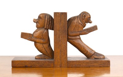 Lot 19 - Pair of carved figural bookends oak, 1930s,...