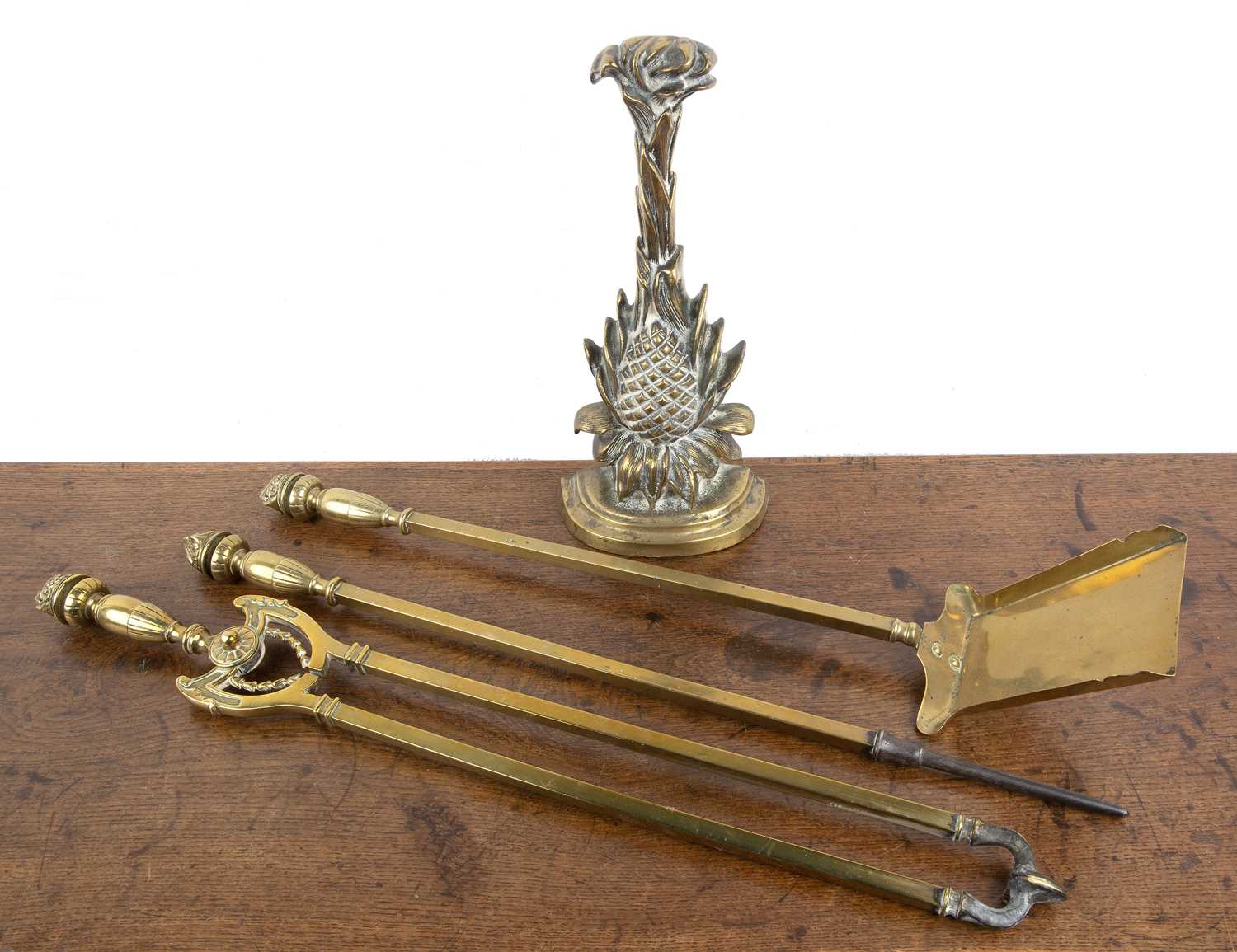 Lot 76 - Victorian brass door porter modelled as a...