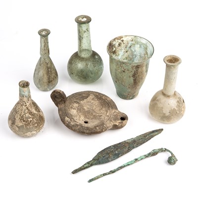 Lot 355 - Five pieces of Roman glass to include a beaker,...