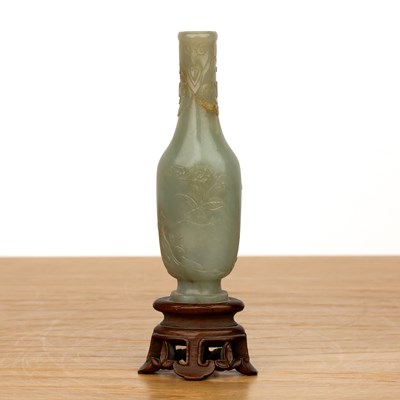 Lot 252 - Small jade miniature vase on a wood stand...