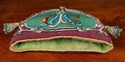 Lot 64 - An old beadwork tea cosy of military interest