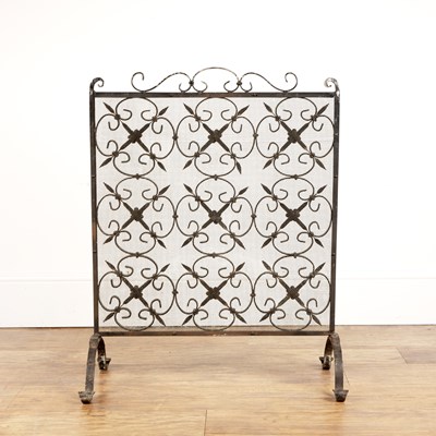 Lot 81 - Wrought iron firescreen with mesh and lattice...