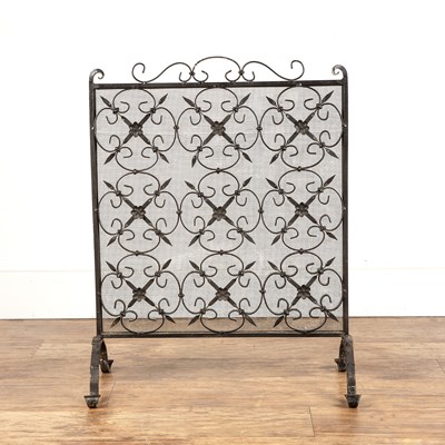 Lot 81 - Wrought iron firescreen with mesh and lattice...