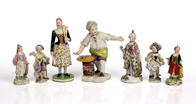 Lot 151 - Antique porcelain figures to include an 18th...