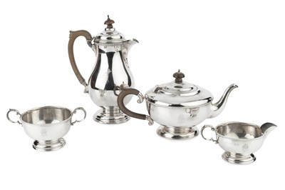 Lot 793 - A George V silver three piece tea service,...