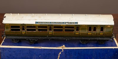 Lot 155 - A group of three Bassett-Lowke Limited 0 gauge painted tin plate Southern Railway carriages