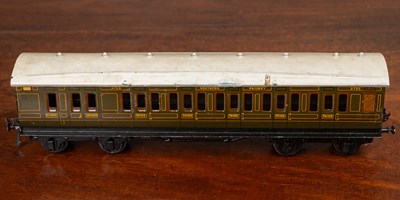 Lot 155 - A group of three Bassett-Lowke Limited 0 gauge painted tin plate Southern Railway carriages