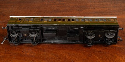 Lot 155 - A group of three Bassett-Lowke Limited 0 gauge painted tin plate Southern Railway carriages