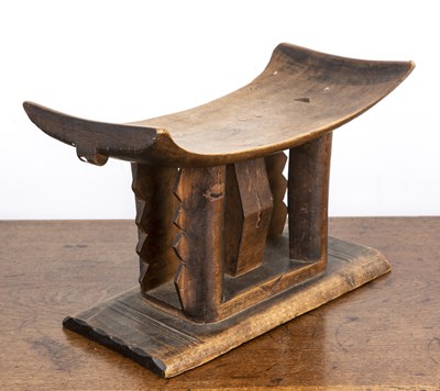 Lot 71 - Ashanti headrest with carved supports, 35cm...