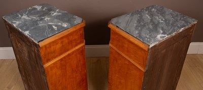 Lot 214 - A pair of Continental marble-topped burr maple bedside cabinets