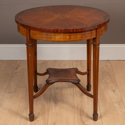 Lot 307 - An Edwardian mahogany occasional table