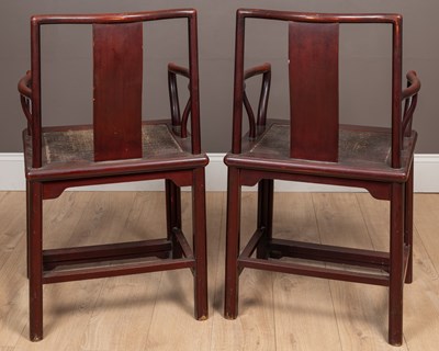 Lot 54 - A pair of Chinese red lacquered elbow chairs