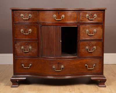 Lot 262 - A George III mahogany serpentine chest