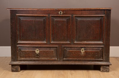 Lot 266 - An 18th century oak mule chest