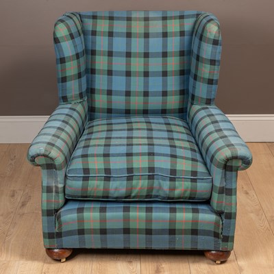 Lot 171 - An early 20th century Tartan upholstered wingback deep armchair