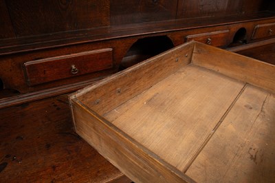 Lot 1129 - A George III oak dressser