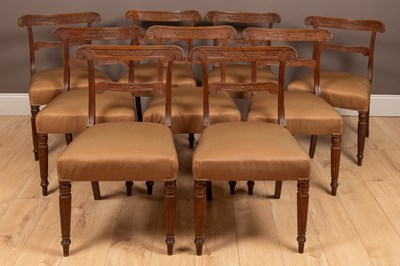 Lot 410 - A set of eight oak bar-back dining chairs