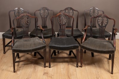 Lot 174 - A set of seven George III mahogany dining chairs