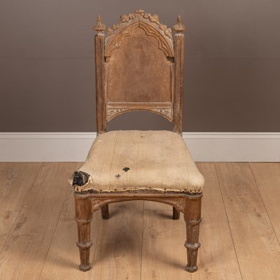 Lot 147 - A 19th century Gothic Revival-style carved oak side chair