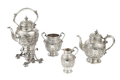 Lot 796 - A late Victorian Scottish silver four piece...