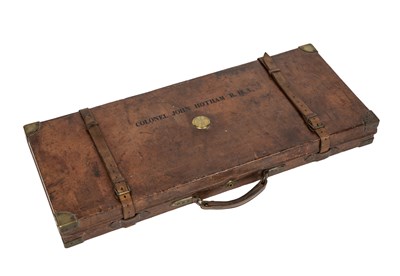 Lot 205 - An early 20th century leather bound oak gun...