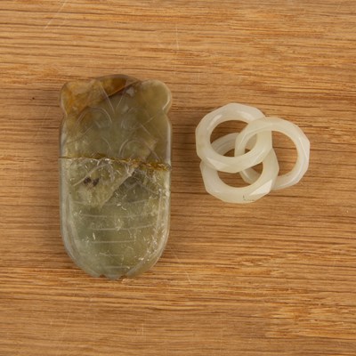 Lot 250 - Carved jade cicada and three jade interlocked...