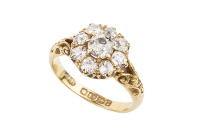 Lot 97 - A late Victorian diamond cluster ring, the...