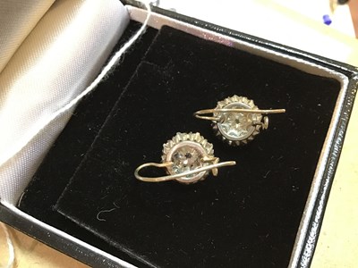 Lot 100 - A pair of diamond cluster earrings, the...