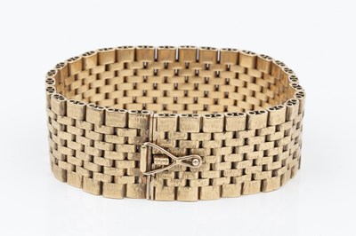 Lot 104 - A 9ct gold flexible link strap bracelet, with...