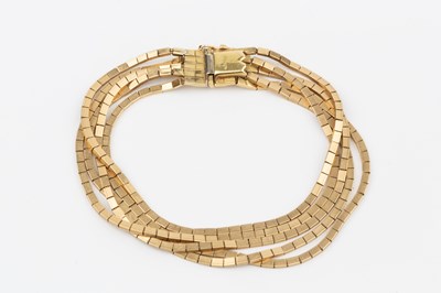 Lot 105 - An 18ct gold five strand bracelet, composed of...