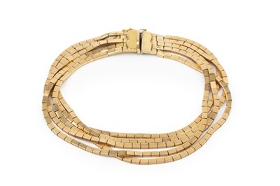Lot 105 - An 18ct gold five strand bracelet, composed of...