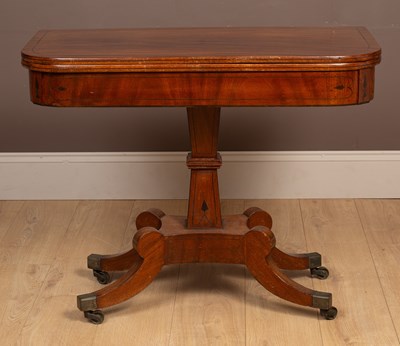 Lot 203 - A Regency mahogany fold-over tea table